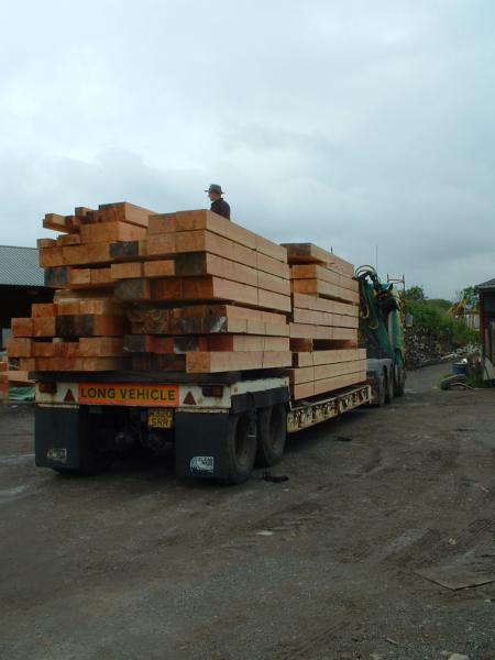 Planed and oiled Douglas fir frame arriving on a lorry.