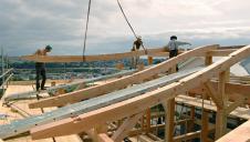 The construction of a curvilinear Douglas fir roof.