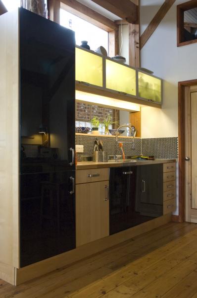 The fitted kitchen in a Douglas fir house.