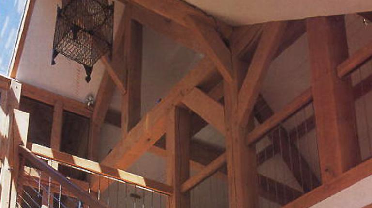 The stairwell in an oak framed house.