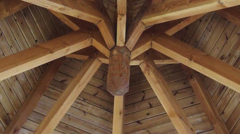 Scissor trusses used to form a conical roof.