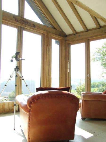 Oak framed sun room with telescope.