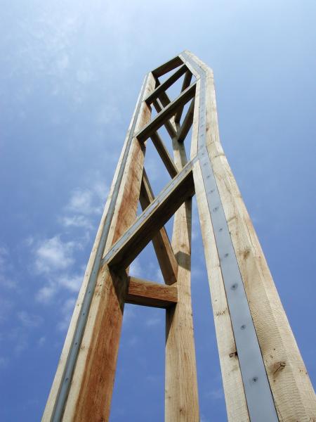 Oak and steel obelisk.