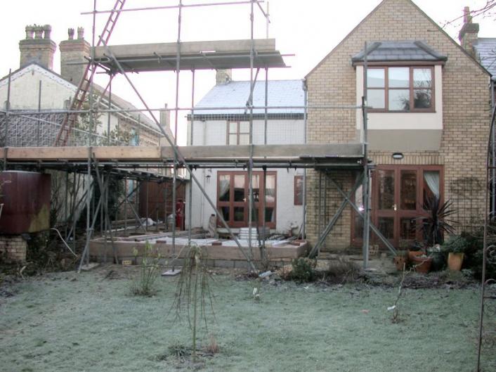 Scaffolding for the construction of an oak framed extension.
