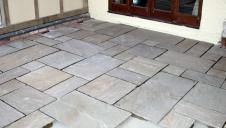 A newly laid stone floor, ready for pointing.