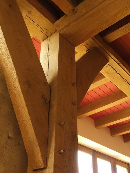 Exposed oak floor beams, posts and joints.